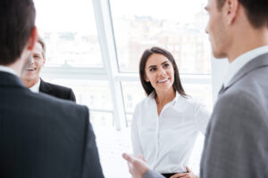 Back view of Business men with woman in office