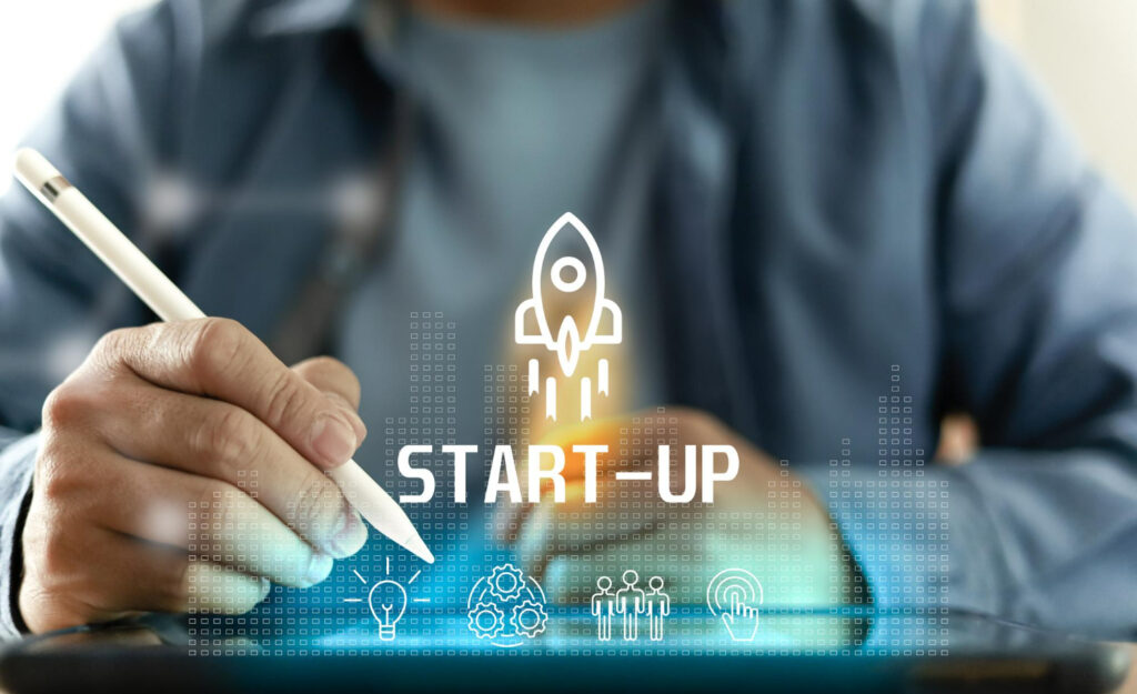 startup-concept-with-icon-business-plan-working-virtual-interface-from-digital-tablet-man-write-tablet-closeup-man-use-pen-with-tablet