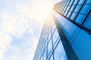 low-angle photo of curtain wall building