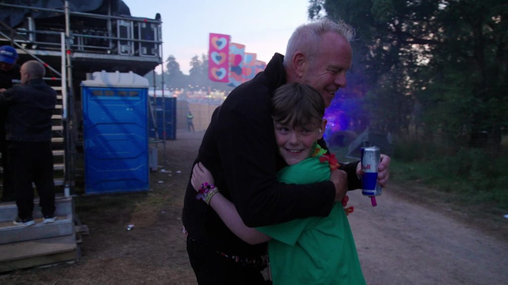 Efan Electro has a hug from Fatboy Slim at Kendal Callling - 2
