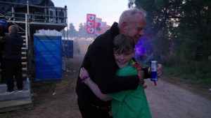 Efan Electro has a hug from Fatboy Slim at Kendal Callling - 2